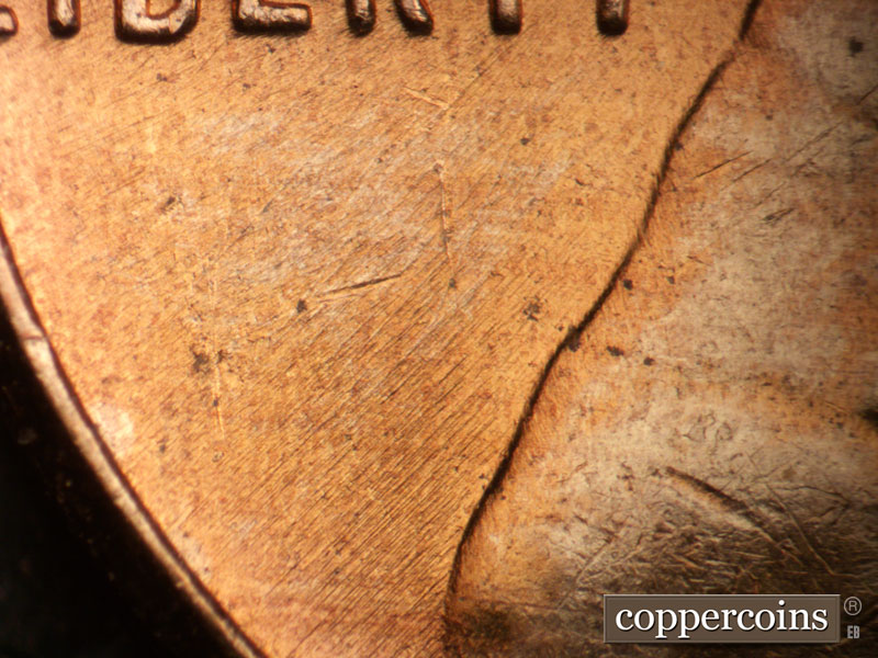 Die-stage B marker on 1958D•1MM•107 (1958 Repunched Mint Mark).