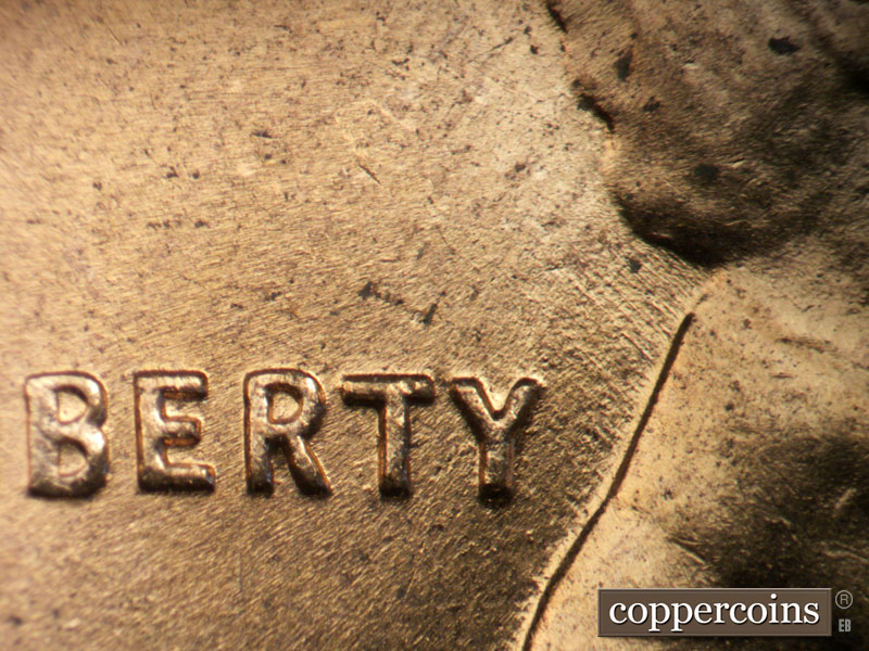 Die-stage B marker on 1958D•1MM•109 (1958 Repunched Mint Mark).