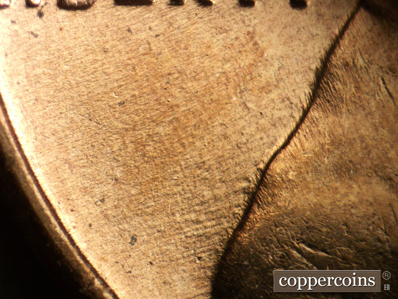 Die-stage B marker on 1958D•1MM•110 (1958 Repunched Mint Mark).