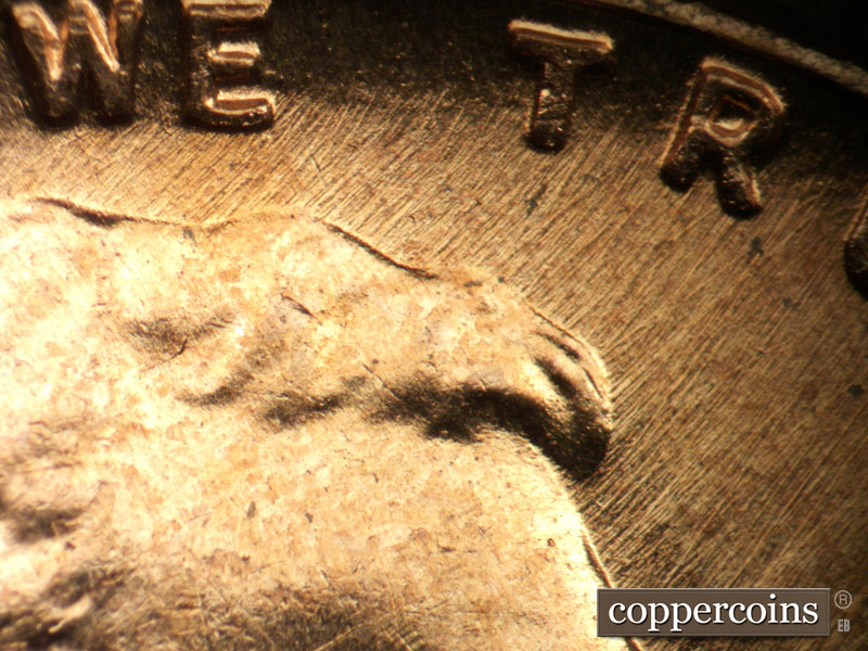 Die-stage B marker on 1958D•1MM•110 (1958 Repunched Mint Mark).