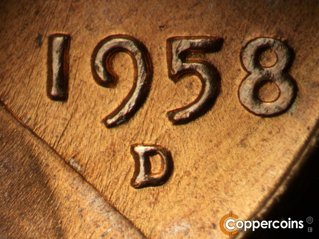 Die-stage B marker on 1958D•1MM•112 showing Closeup of repunched mint mark.