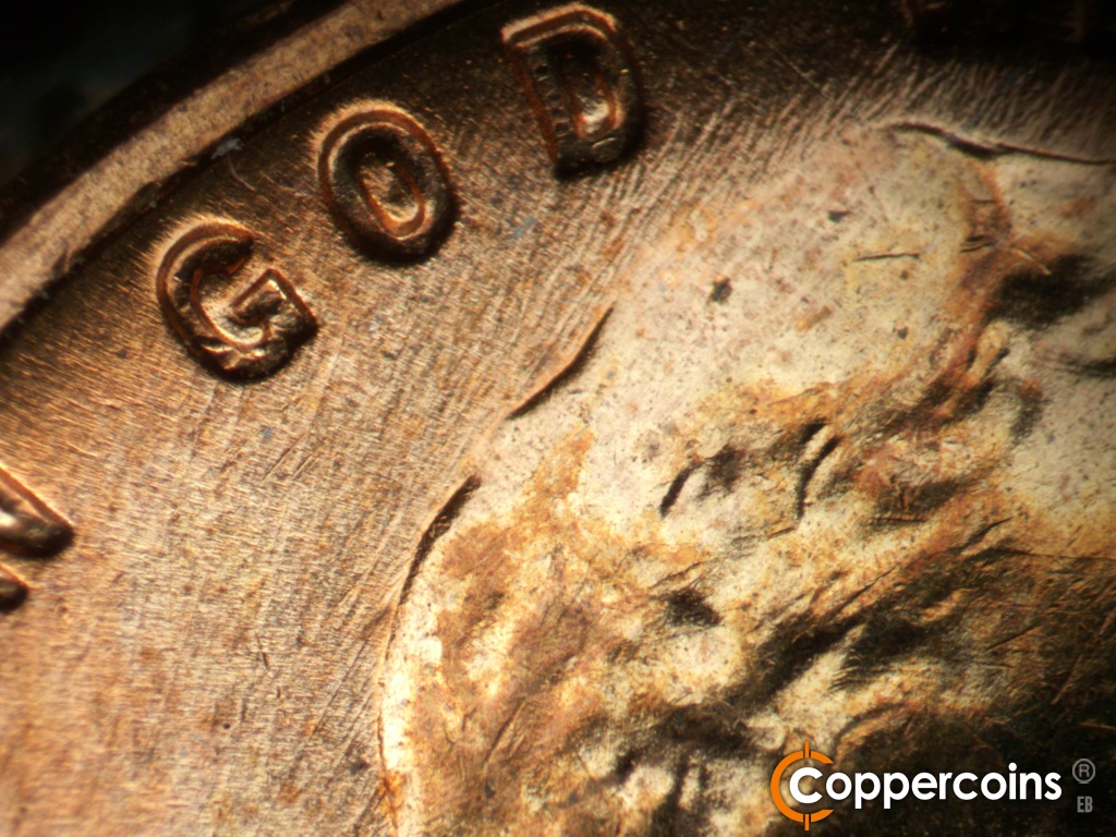Die-stage B marker on 1958D•1MM•112 showing Die scratches under GOD.