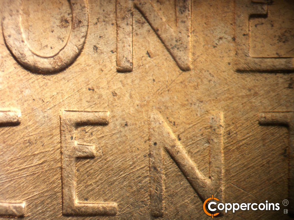 Die-stage C marker on 1958D•1MM•112 showing Die scratches through CENT.
