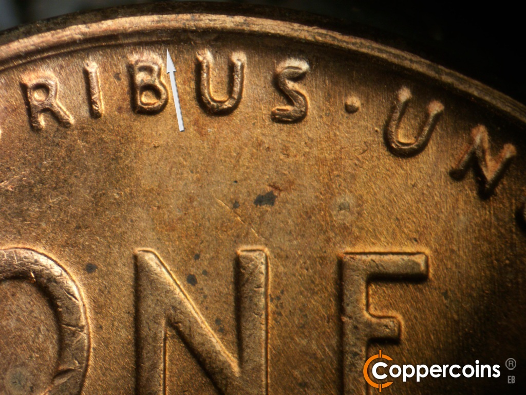 Die-stage B marker on 1958D•1MM•116 showing Concentric die scratch between rim and E PLURIBUS.