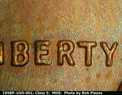 Die-stage B marker on 1958P•1DO•001 (1958 Doubled Die Obverse).