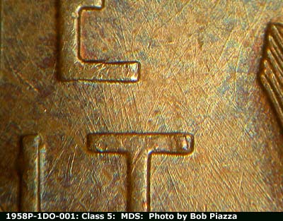 Die-stage B marker on 1958P•1DO•001 (1958 Doubled Die Obverse).