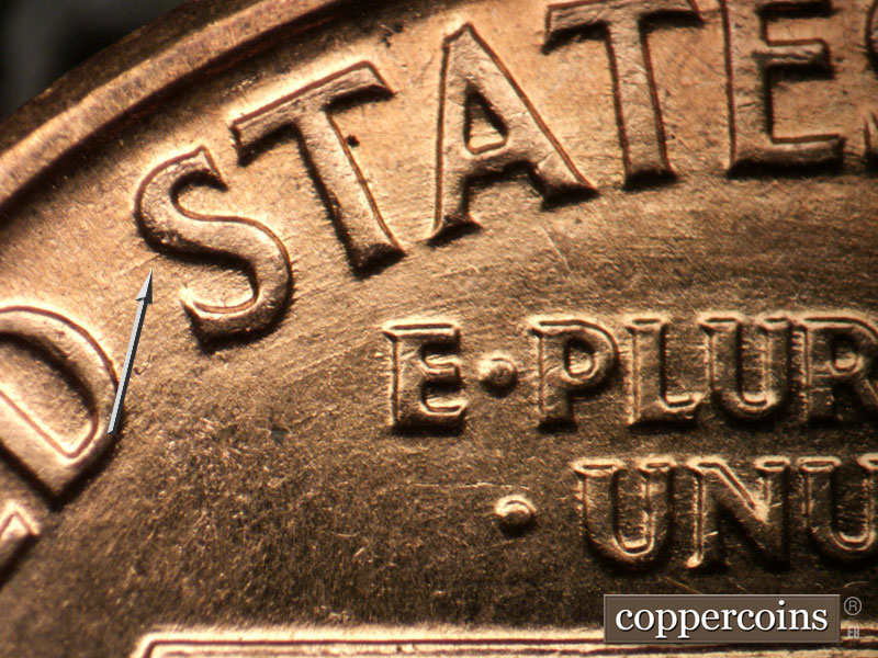 Die-stage A marker on 1959D•1DO•002 (1959 Doubled Die Obverse).