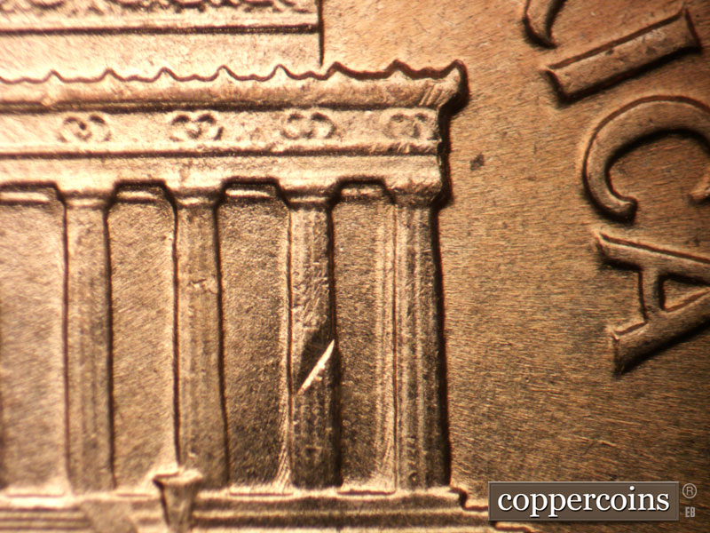 Die-stage A marker on 1959D•1DO•002 (1959 Doubled Die Obverse).