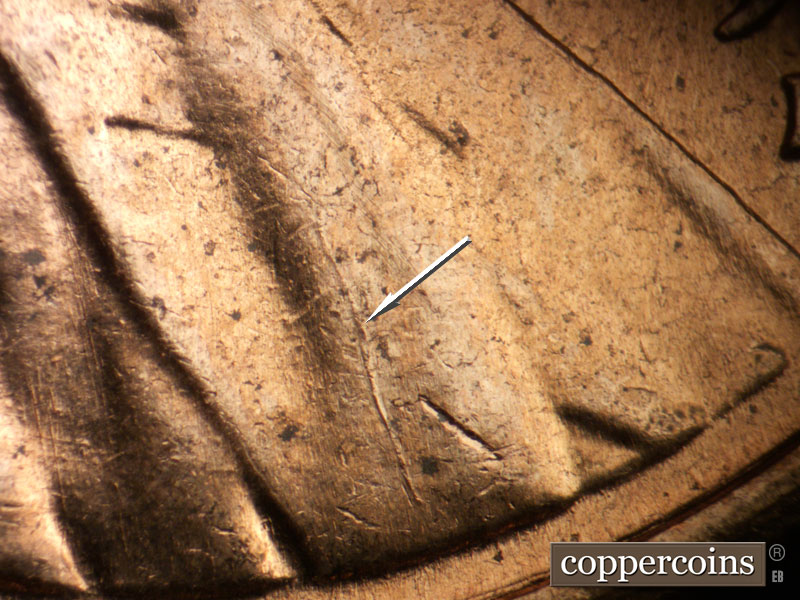 Die-stage B marker on 1959D•1DO•002 (1959 Doubled Die Obverse).