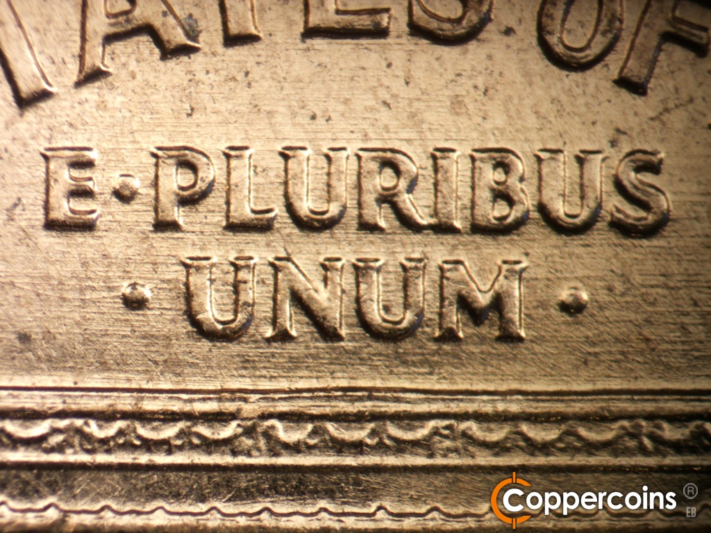 Die-stage B marker on 1959D•1DR•002 showing E/W die scratches through E PLURIBUS UNUM.