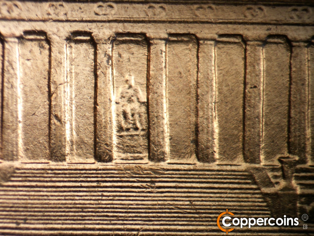 Die-stage B marker on 1959D•1DR•002 showing Concentric scratches in lower bays 6 and 7.