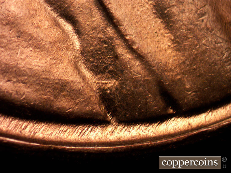 Die-stage B marker on 1959D•1MM•013 (1959 Repunched Mint Mark).