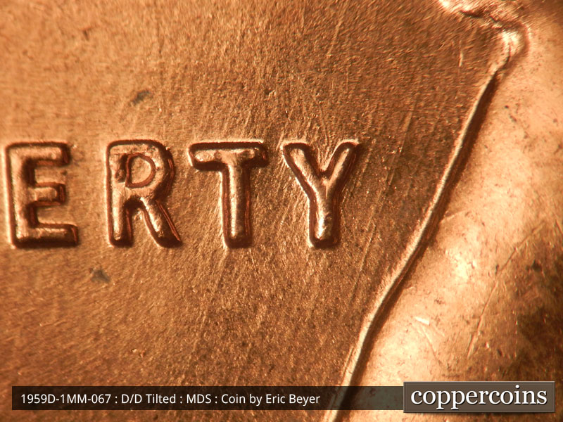 Die-stage B marker on 1959D•1MM•067 (1959 Repunched Mint Mark).