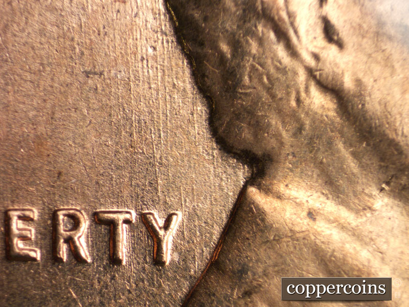 Die-stage B marker on 1959D•1MM•087 (1959 Repunched Mint Mark).