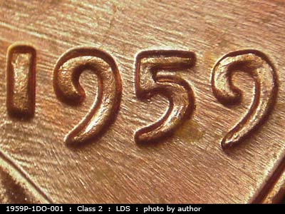 Die-stage C marker on 1959P•1DO•001 (1959 Doubled Die Obverse).