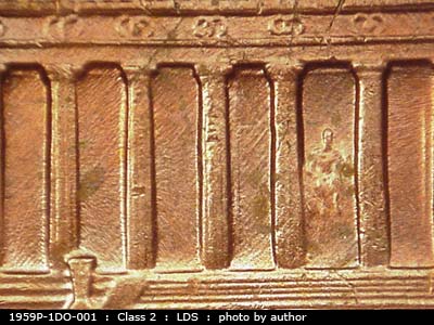 Die-stage C marker on 1959P•1DO•001 (1959 Doubled Die Obverse).