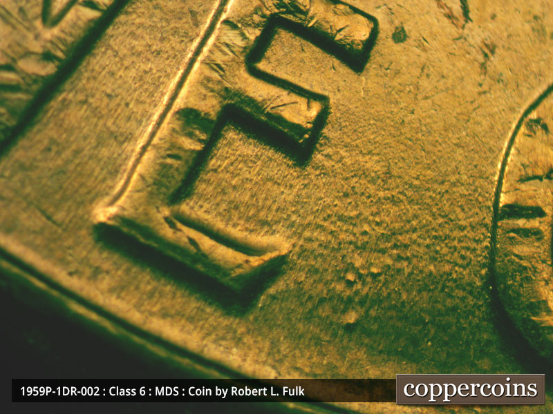 Die-stage B marker on 1959P•1DR•002 (1959 Doubled Die Reverse).