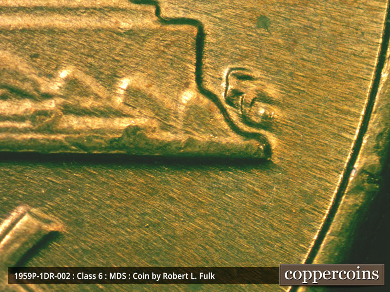 Die-stage B marker on 1959P•1DR•002 (1959 Doubled Die Reverse).