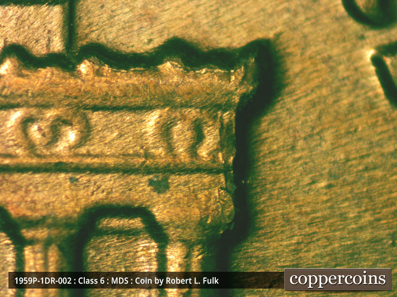 Die-stage B marker on 1959P•1DR•002 (1959 Doubled Die Reverse).