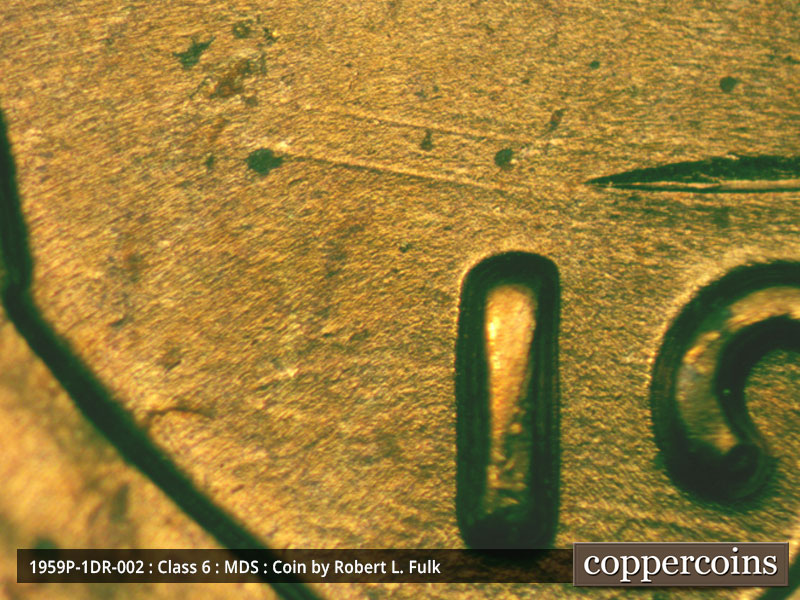 Die-stage B marker on 1959P•1DR•002 (1959 Doubled Die Reverse).