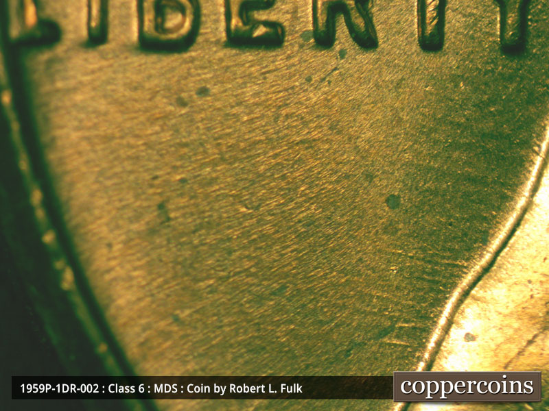 Die-stage B marker on 1959P•1DR•002 (1959 Doubled Die Reverse).