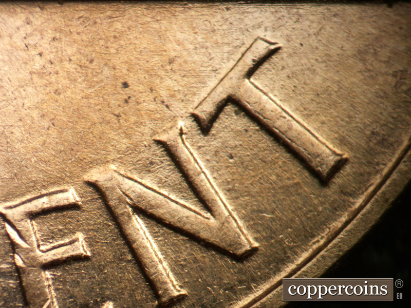 Die-stage B marker on 1960D•1DO•001 showing Light concentric scratches through CENT.