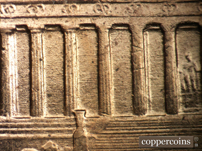 Die-stage B marker on 1960D•1DO•001 showing E/W die scratches in bays.