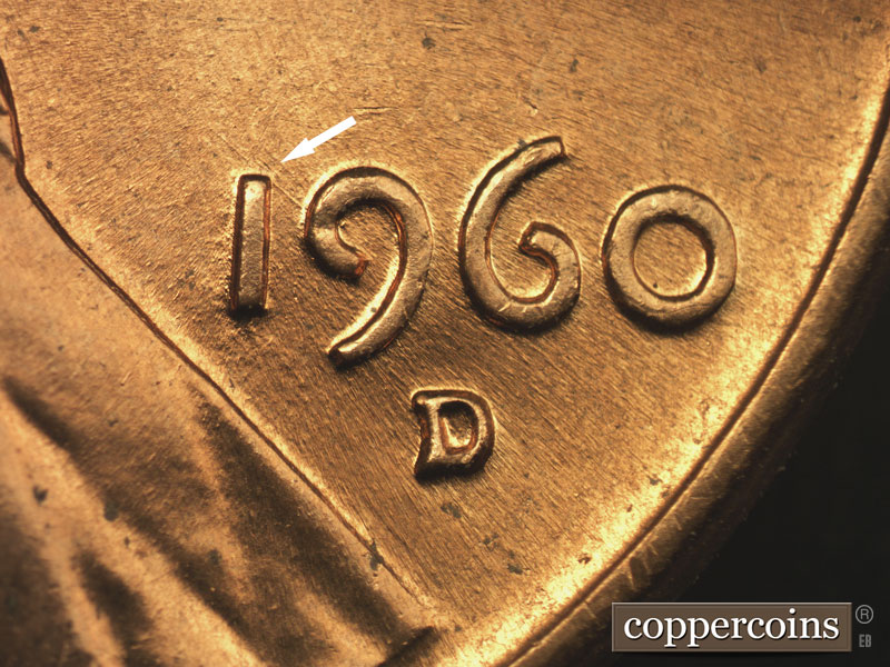 Die-stage B marker on 1960D•1DO•006 showing NW die scratch from 9 up to 1 in date.