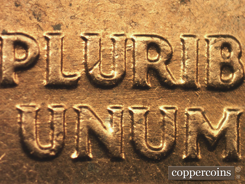 Die-stage B marker on 1960D•1DO•006 showing Light E/W die scratches through E PLURIBUS UNUM.