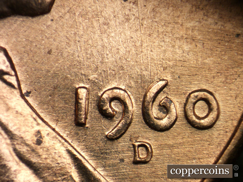 Die-stage B marker on 1960D•1DO•007 showing E/W die scratches through and under date.