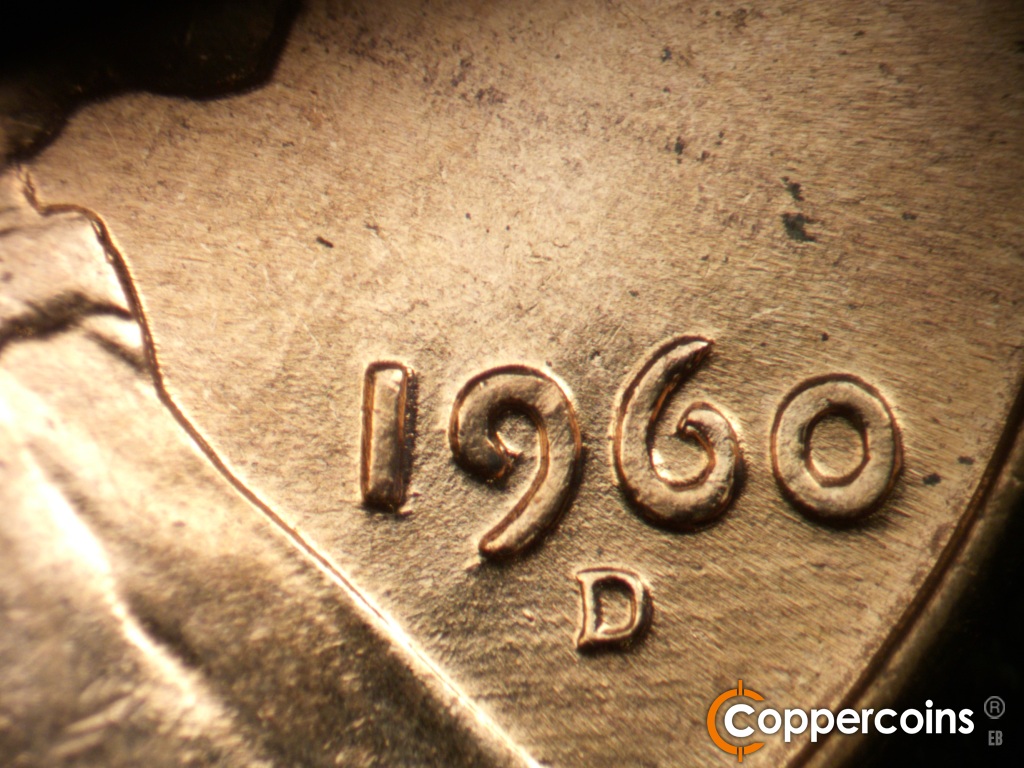 Die-stage C marker on 1960D•1DO•007 showing Worn E/W die scratches under date.