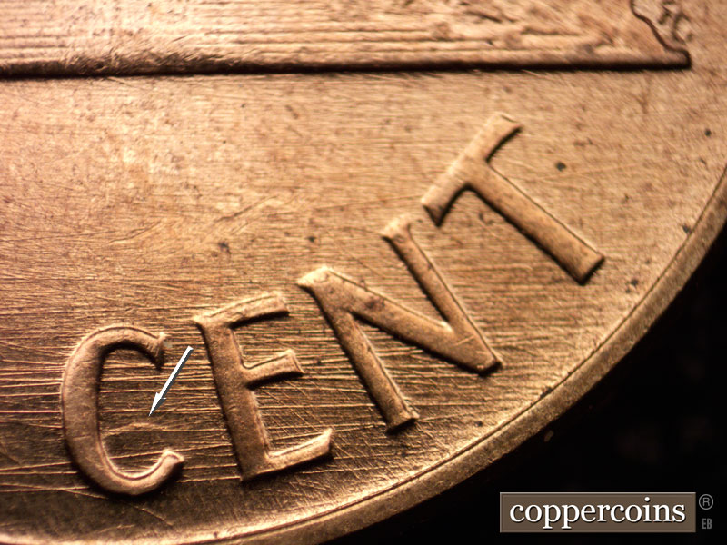 Die-stage B marker on 1960D•1MM•001 showing E/W die scratches through CENT, Die clash in C of CENT.