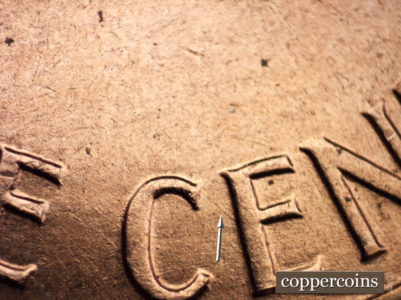 Die-stage C marker on 1960D•1MM•001 showing SE die scratch connects CE in CENT.