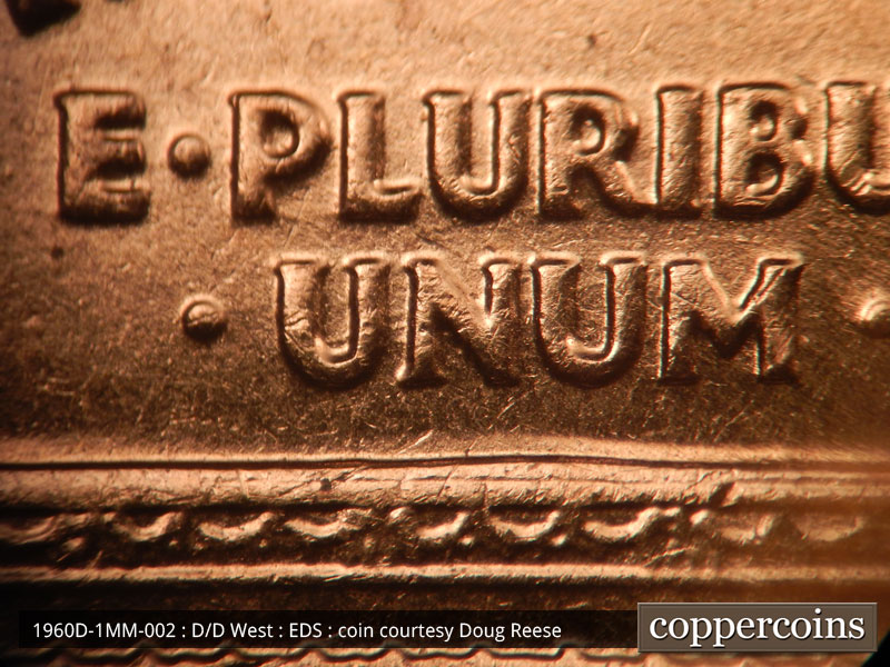 Die-stage A marker on 1960D•1MM•002 showing Light gouge from bottom of P in PLURIBUS.