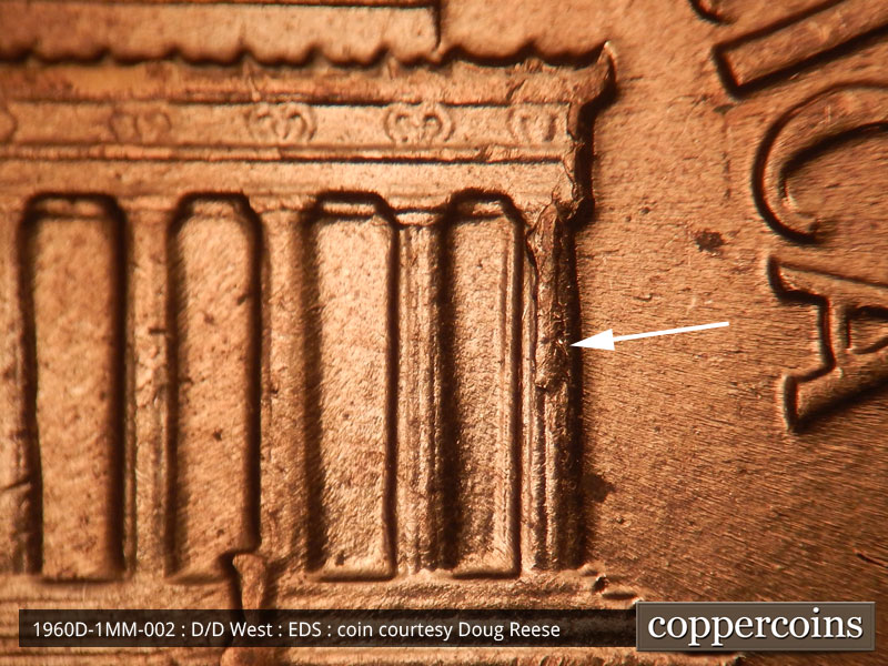 Die-stage A marker on 1960D•1MM•002 showing Die chipping on column 12.