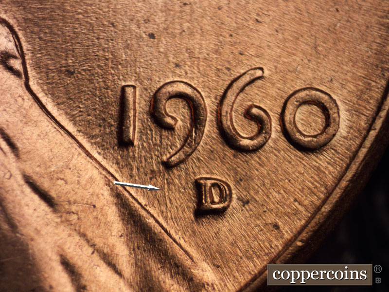 Die-stage B marker on 1960D•1MM•002 showing Worn N/S die scratches through 19 in date.