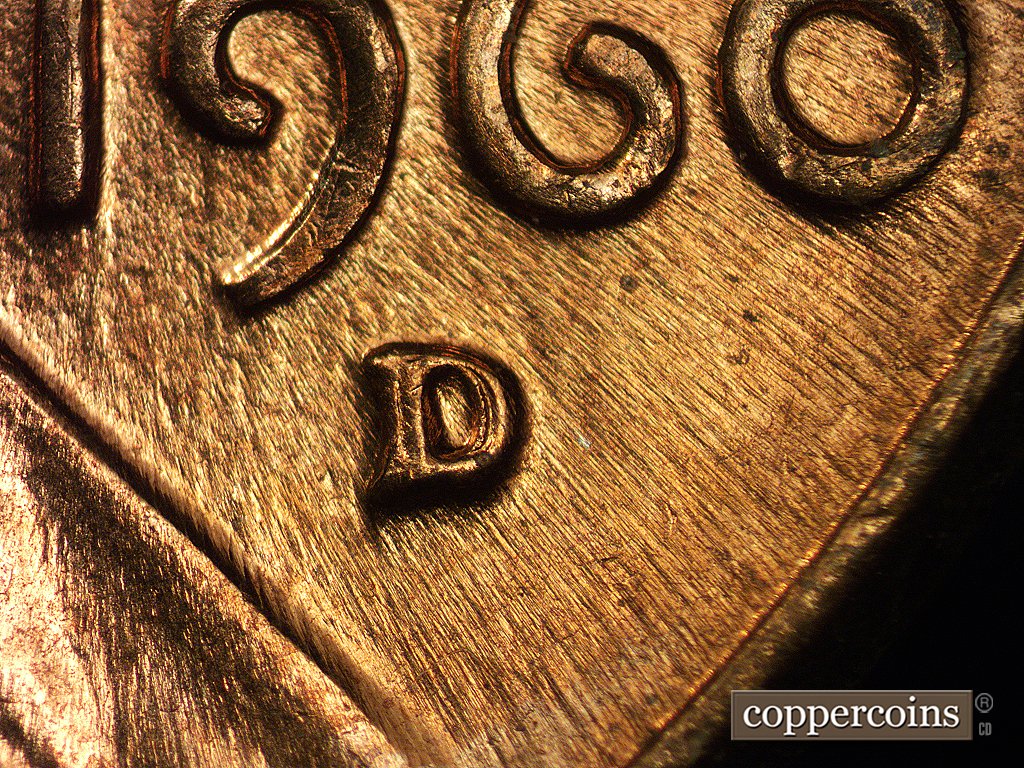 Die-stage C marker on 1960D•1MM•002 showing N-S die scratches in and around the date are still visible but very worn.