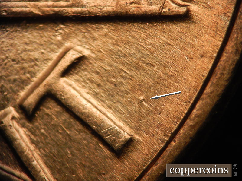 Die-stage D marker on 1960D•1MM•002 showing die dot east of T in CENT.