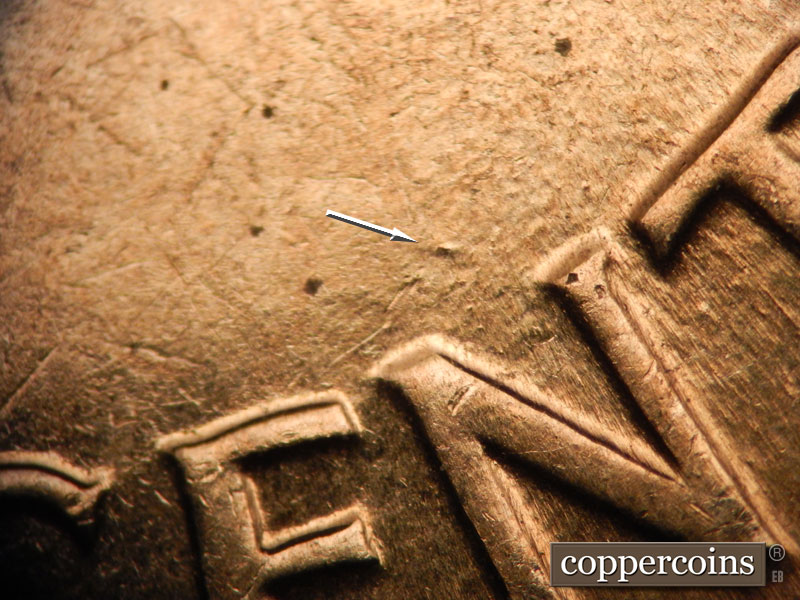 Die-stage D marker on 1960D•1MM•002 showing Die dot above N in CENT.