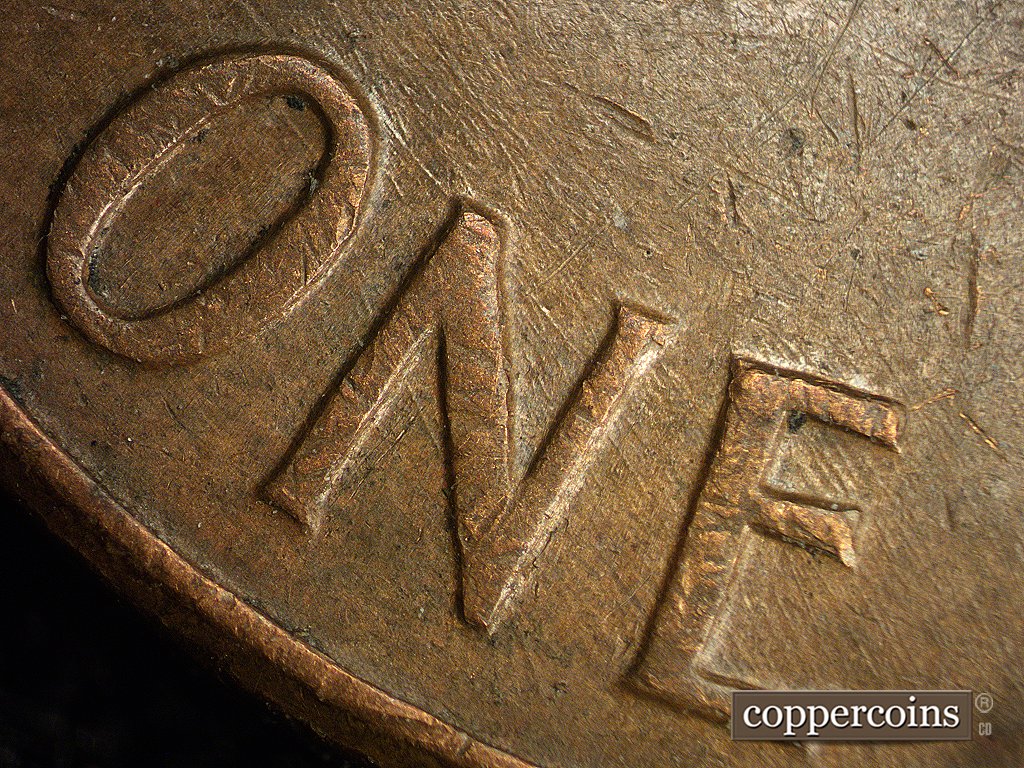 Die-stage A marker on 1960D•1MM•003 showing Same near vertical die scratches continue through bay #1 and into ONE.