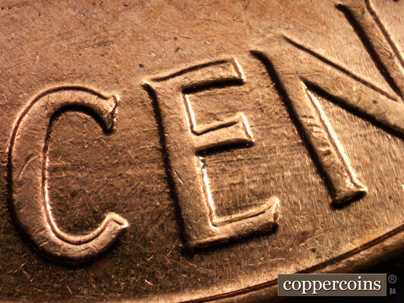 Die-stage B marker on 1960D•1MM•004 showing Die scratches through CENT.