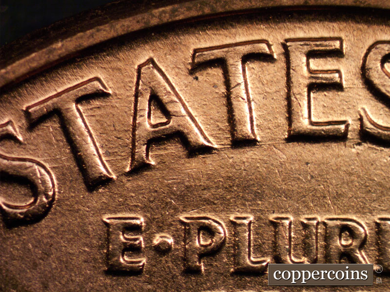 Die-stage B marker on 1960D•1MM•004 showing E/W die scratched through STA in STATES.