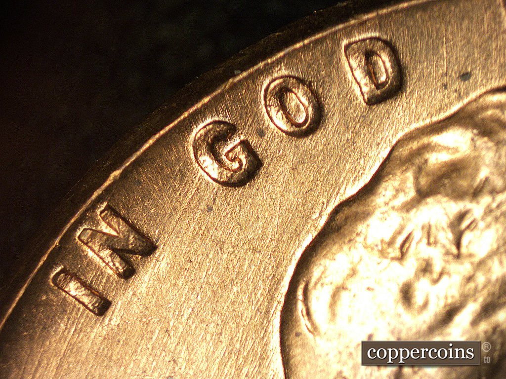 Die-stage A marker on 1960D•1MM•004 showing Thin, sharp die scratches show throughout IN GOD.