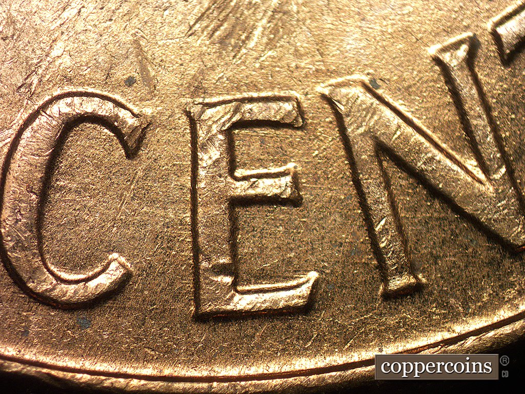 Die-stage A marker on 1960D•1MM•004 showing Die scratches show throughout CENT.