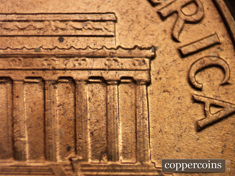 Die-stage A marker on 1960D•1MM•005 showing No die breaks on column 12 or right cornice as in other die states.