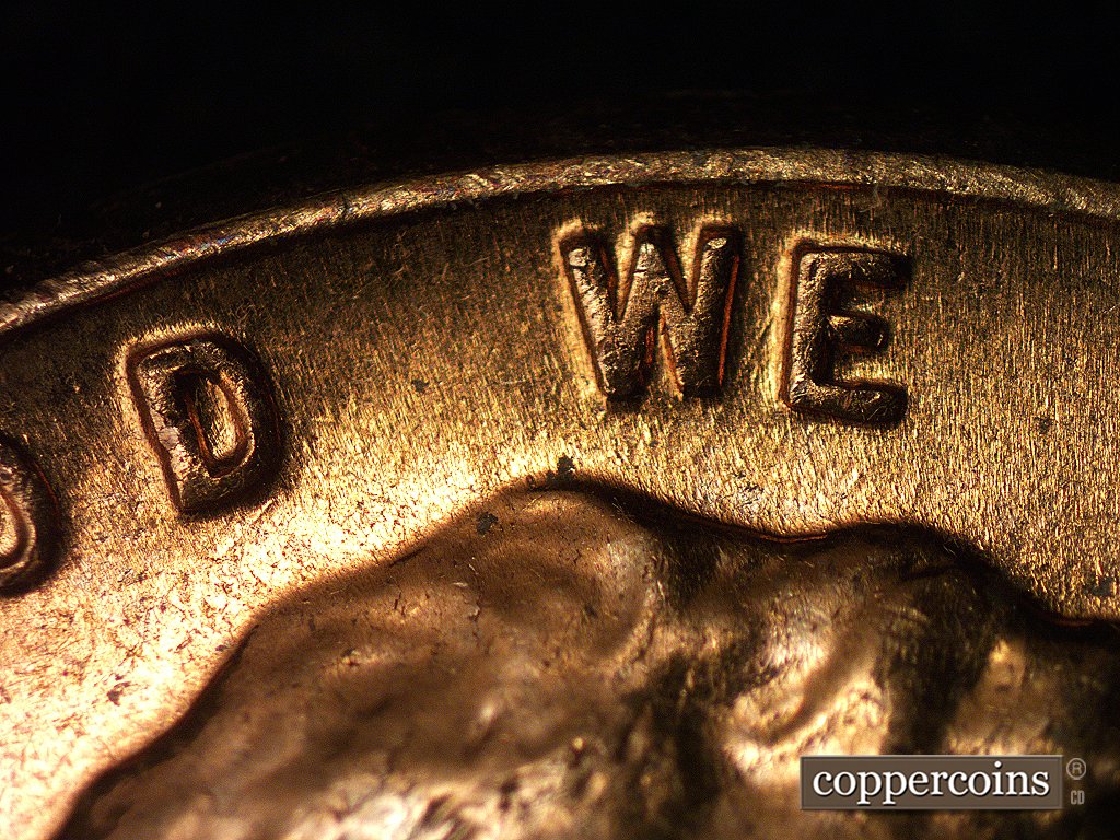 Die-stage B marker on 1960D•1MM•005 showing Diagonal die scratches at the base of D of GOD and between W and E.