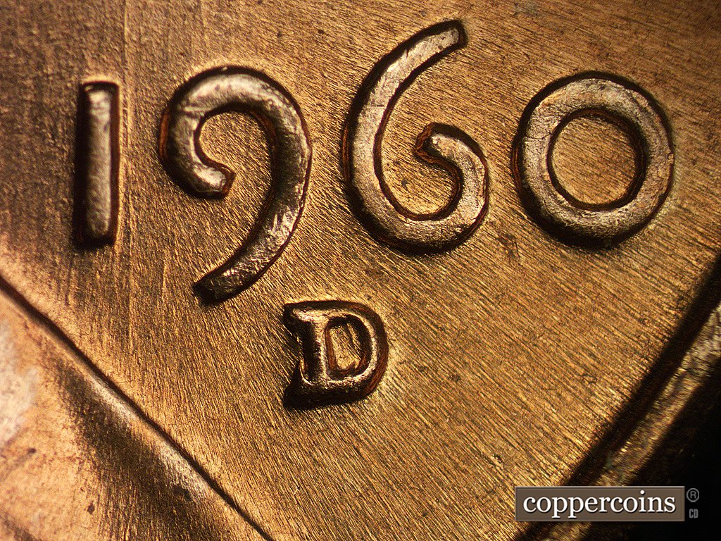 Die-stage C marker on 1960D•1MM•006 showing N-S die scratches around the date and mint mark are softer, weaker.
