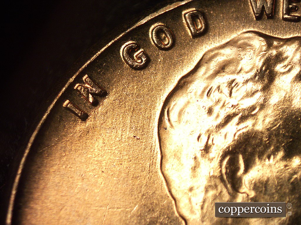 Die-stage C marker on 1960D•1MM•006 showing Older N-S die scratches show in the left field.