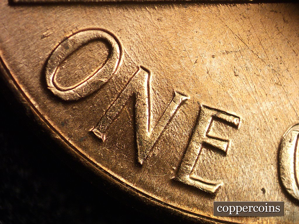 Die-stage C marker on 1960D•1MM•006 showing Die scratches show in ONE.