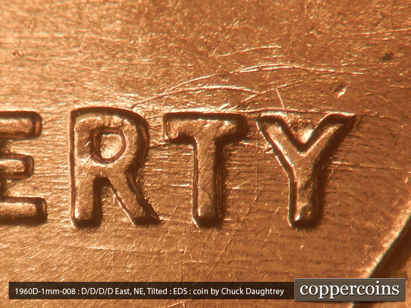 Die-stage A marker on 1960D•1MM•008 showing Die scratches through RTY in LIBERTY.